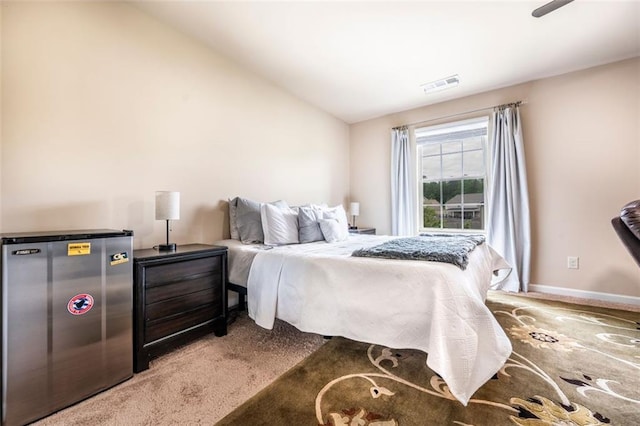 8553 Braylen Manor Dr, Douglasville, GA 30134 - carpeted bedroom with vaulted ceiling and baseboards
