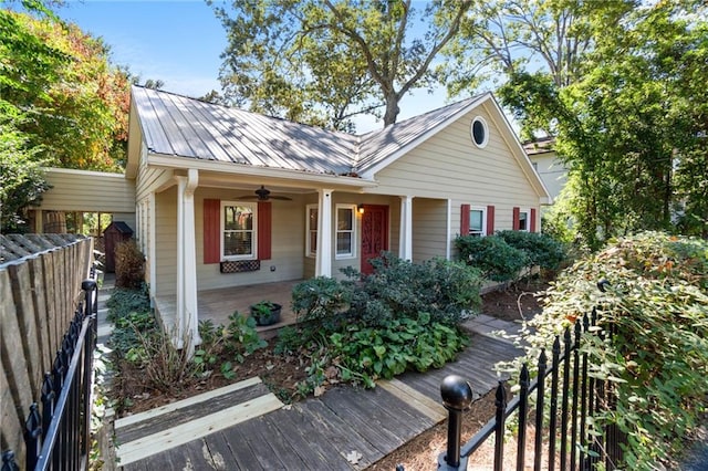 view of front of house featuring ceiling fan and covered porch