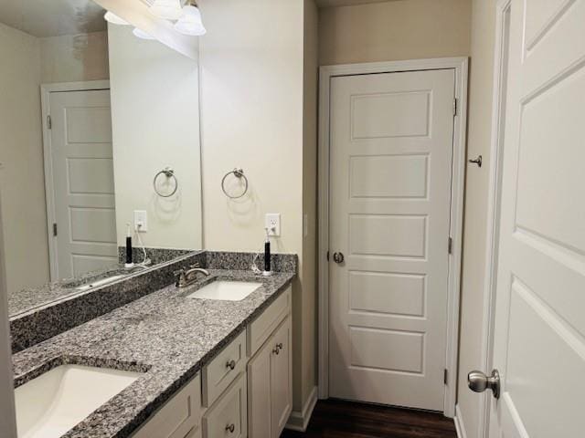 50 Scout Hut Rd, Danielsville, GA 30633 - bathroom with double vanity and wood finished floors