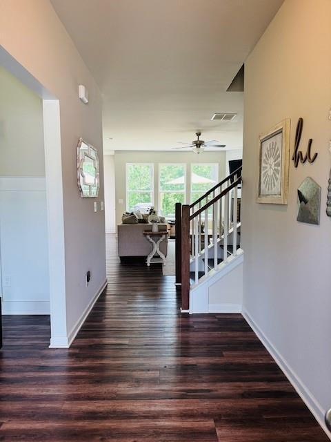 50 Scout Hut Rd, Danielsville, GA 30633 - corridor with stairway, wood finished floors, and baseboards
