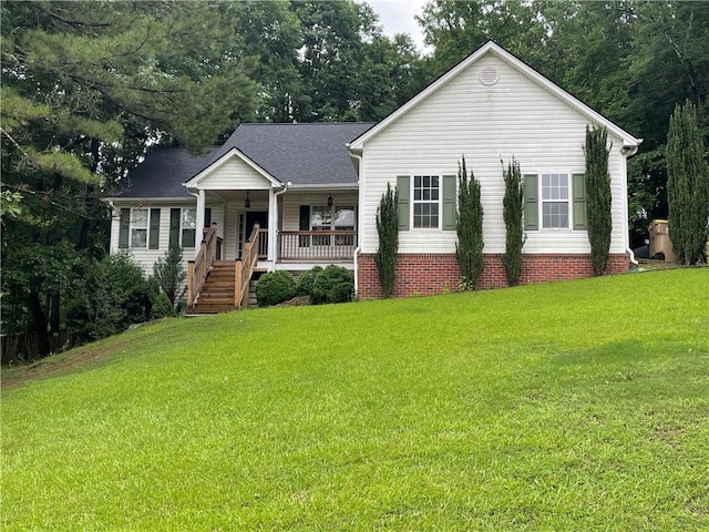 574 Saddle Ridge Dr, Bethlehem, GA 30620 - view of front of house with covered porch and a front yard