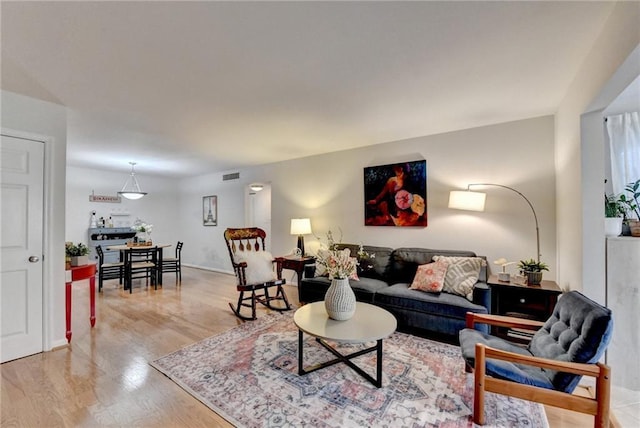 living room with light wood-type flooring