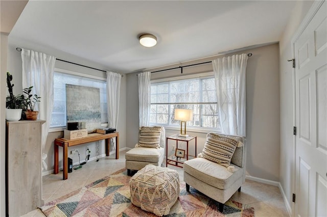 living area with light tile patterned floors