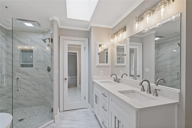 bathroom with walk in shower, a skylight, vanity, and ornamental molding