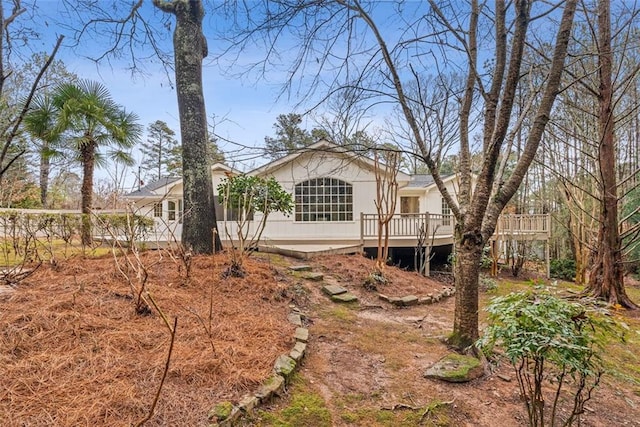 exterior space with a wooden deck