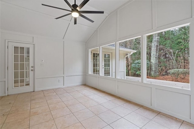 unfurnished sunroom with ceiling fan and lofted ceiling