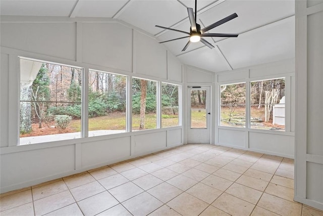 unfurnished sunroom featuring ceiling fan and lofted ceiling