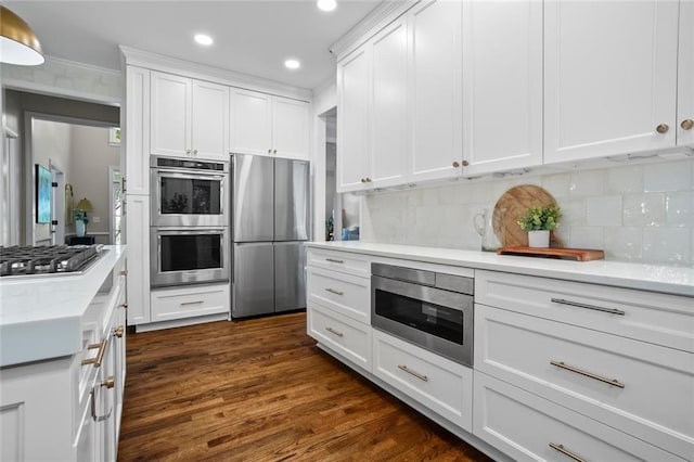 605 Linkside Holw, Alpharetta, GA 30005 - kitchen with appliances with stainless steel finishes, white cabinets, decorative backsplash, dark wood-style flooring, and recessed lighting
