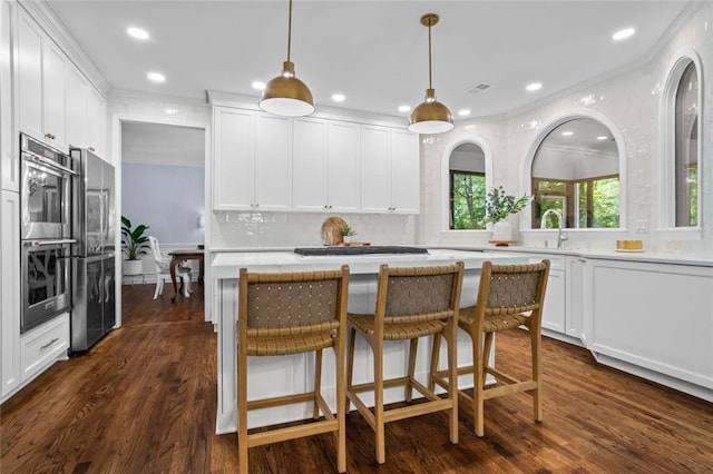 605 Linkside Holw, Alpharetta, GA 30005 - kitchen featuring light countertops, white cabinetry, stainless steel appliances, recessed lighting, and ornamental molding