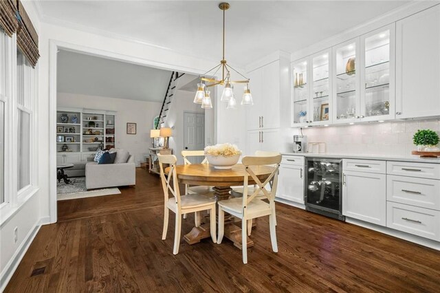 605 Linkside Holw, Alpharetta, GA 30005 - dining room featuring beverage cooler, dark wood-style flooring, a chandelier, and bar