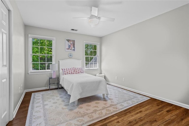 605 Linkside Holw, Alpharetta, GA 30005 - bedroom featuring wood finished floors and a ceiling fan