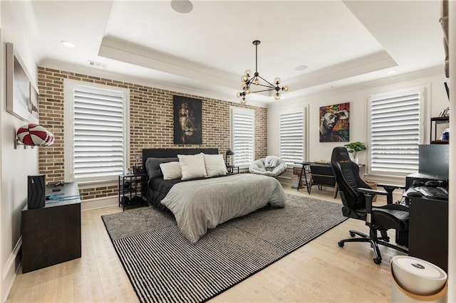 132 Grand Cres, Alpharetta, GA 30009 - bedroom featuring a tray ceiling, an office area, multiple windows, and brick wall