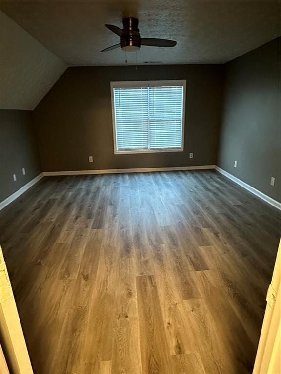 bonus room featuring vaulted ceiling, ceiling fan, and hardwood / wood-style floors