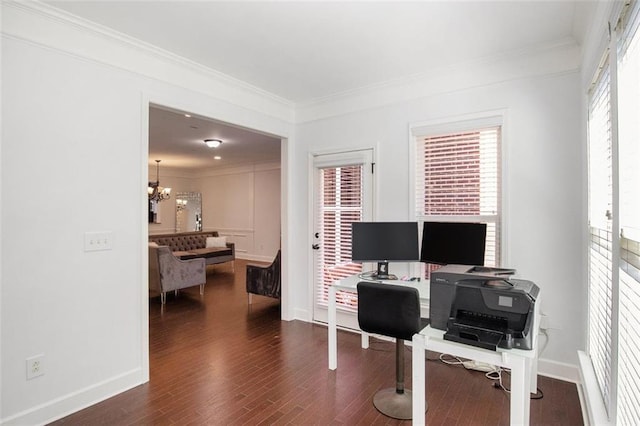 office area with a wealth of natural light, dark hardwood / wood-style flooring, and ornamental molding