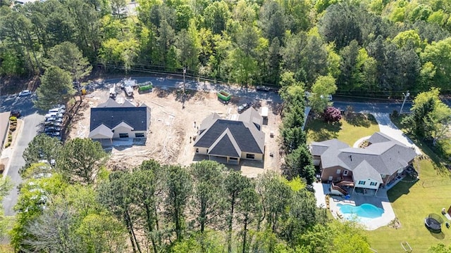 130 Cambridge Ct, Calhoun, GA 30701 - drone / aerial view of a pool and a heavily wooded area