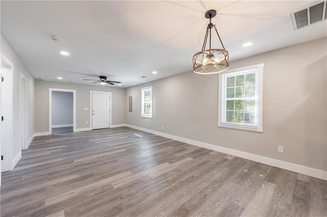 141 Nathan Rd, Atlanta, GA 30331 - unfurnished room featuring baseboards, wood finished floors, recessed lighting, a chandelier, and a smoke detector