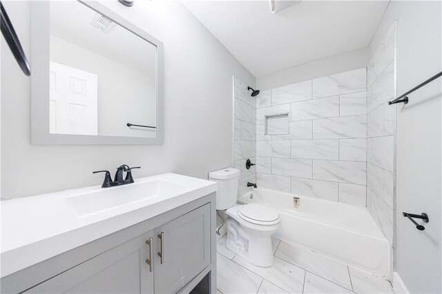 141 Nathan Rd, Atlanta, GA 30331 - full bathroom with toilet, vanity, shower / washtub combination, and marble look tile flooring