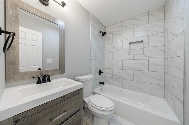 141 Nathan Rd, Atlanta, GA 30331 - bathroom with toilet, vanity, shower / washtub combination, and marble look tiles