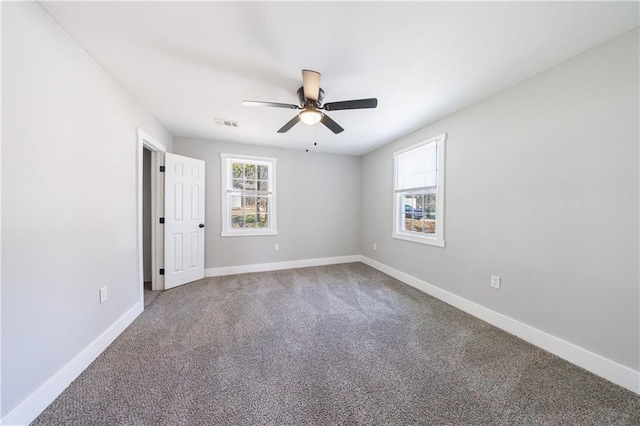 141 Nathan Rd, Atlanta, GA 30331 - empty room with ceiling fan, baseboards, and carpet flooring