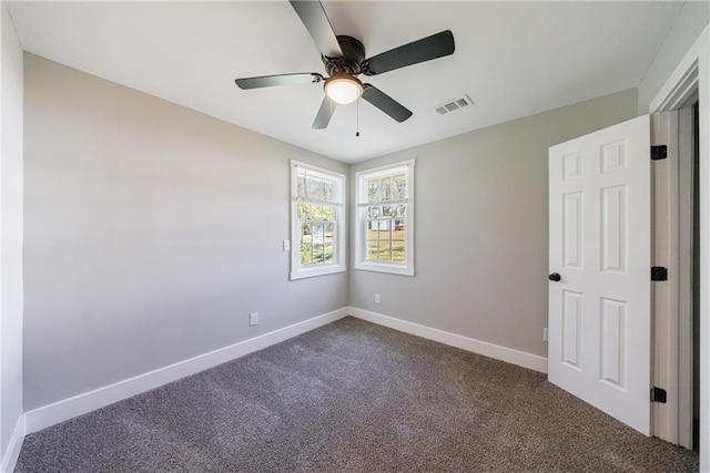 141 Nathan Rd, Atlanta, GA 30331 - empty room featuring dark colored carpet, ceiling fan, and baseboards
