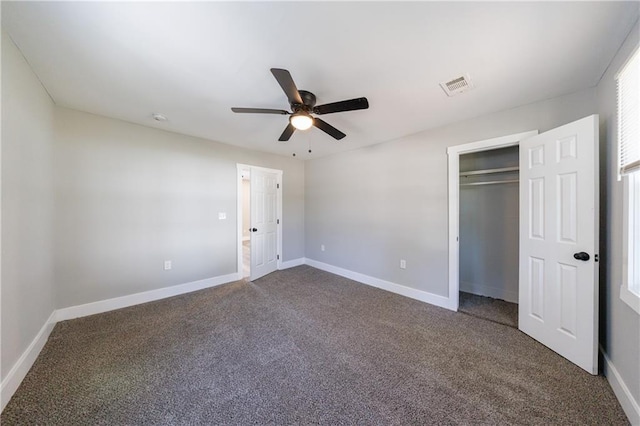 141 Nathan Rd, Atlanta, GA 30331 - unfurnished bedroom with carpet, baseboards, a ceiling fan, and a closet