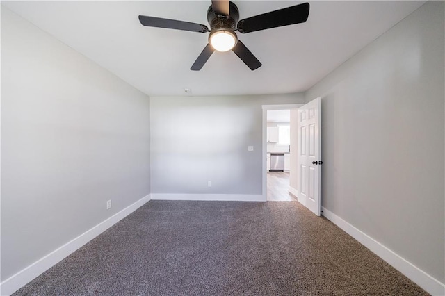 141 Nathan Rd, Atlanta, GA 30331 - empty room with carpet floors, baseboards, and ceiling fan