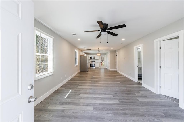 141 Nathan Rd, Atlanta, GA 30331 - unfurnished living room with ceiling fan, recessed lighting, wood finished floors, and baseboards