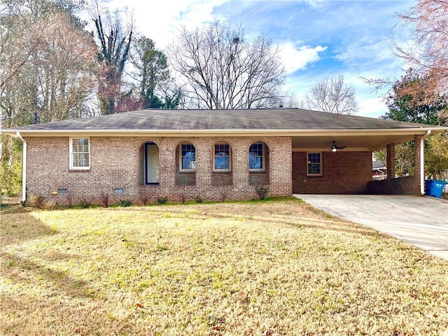 ranch-style home with concrete driveway, brick siding, crawl space, and a front yard