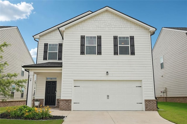 29 Gaston Ct, Hoschton, GA 30548 - view of front of house featuring driveway, a garage, brick siding, and a front lawn