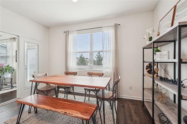 29 Gaston Ct, Hoschton, GA 30548 - dining area with dark wood-type flooring and baseboards