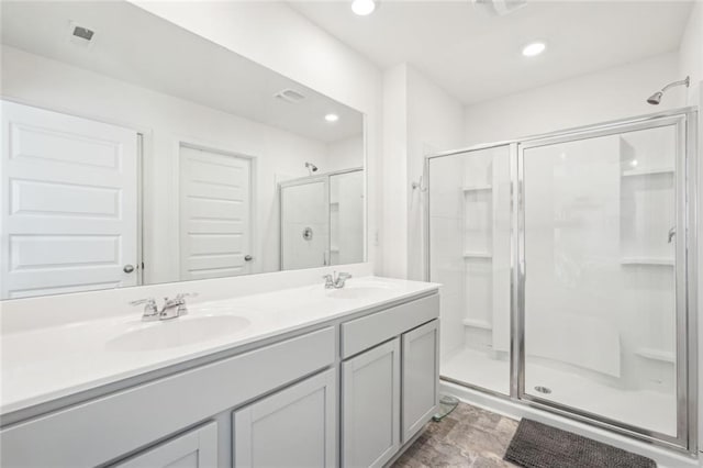 29 Gaston Ct, Hoschton, GA 30548 - full bath with a stall shower, double vanity, and recessed lighting