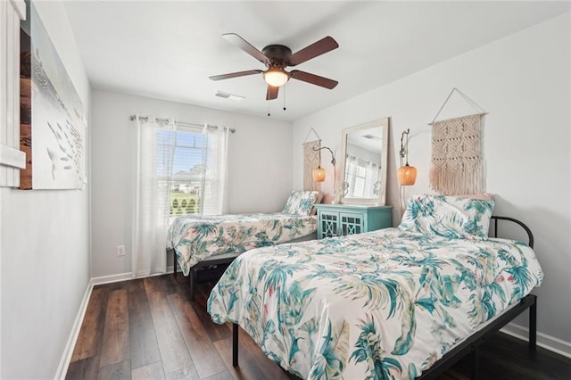 29 Gaston Ct, Hoschton, GA 30548 - bedroom with baseboards, hardwood / wood-style flooring, and a ceiling fan