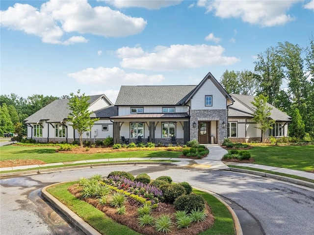 29 Gaston Ct, Hoschton, GA 30548 - view of front of house with stone siding and a front yard