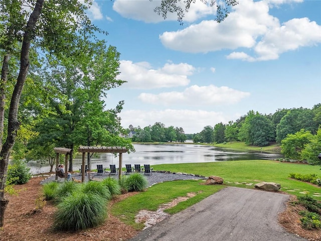 29 Gaston Ct, Hoschton, GA 30548 - view of green lawn with a water view and a pergola