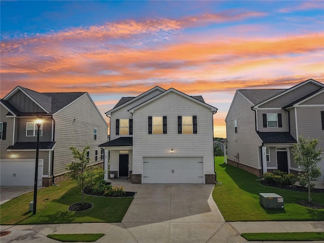 29 Gaston Ct, Hoschton, GA 30548 - view of front of house featuring an attached garage, driveway, and a yard
