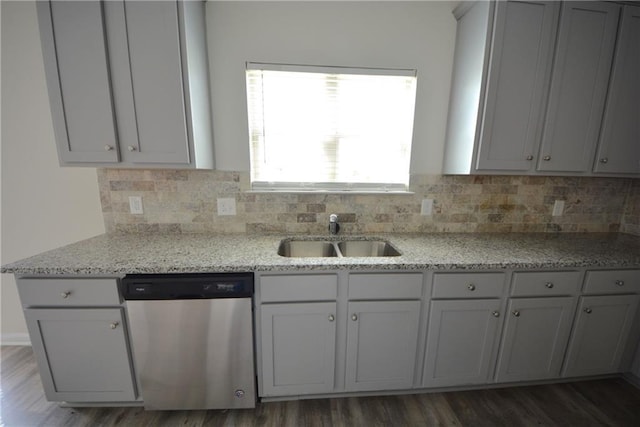 7753 Hansel Ln, Lithonia, GA 30058 - kitchen featuring stainless steel dishwasher, dark wood-style floors, and tasteful backsplash