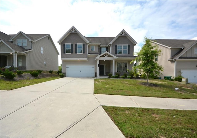 7753 Hansel Ln, Lithonia, GA 30058 - craftsman house featuring driveway, an attached garage, and a front lawn