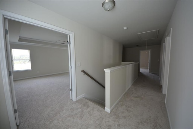 7753 Hansel Ln, Lithonia, GA 30058 - hallway featuring an upstairs landing, light colored carpet, and attic access