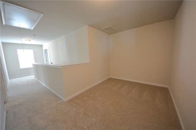 7753 Hansel Ln, Lithonia, GA 30058 - additional living space featuring attic access and light colored carpet