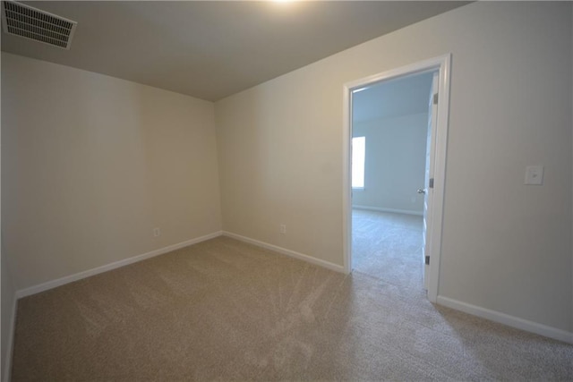 7753 Hansel Ln, Lithonia, GA 30058 - empty room featuring light colored carpet and baseboards