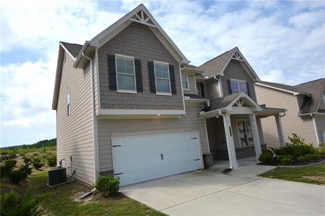 7753 Hansel Ln, Lithonia, GA 30058 - craftsman house featuring concrete driveway and an attached garage