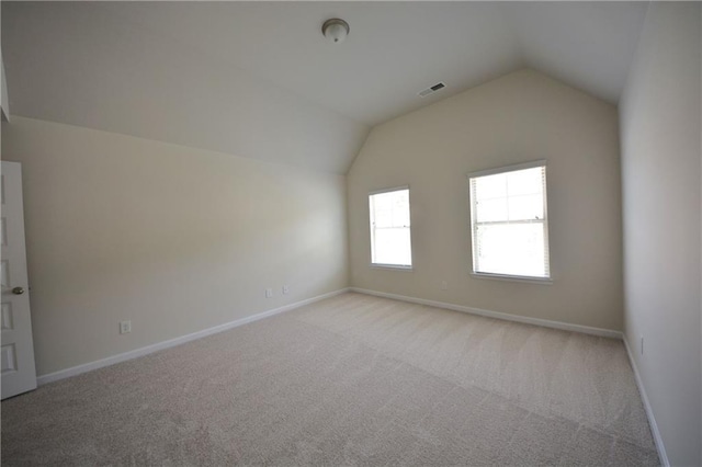 7753 Hansel Ln, Lithonia, GA 30058 - additional living space featuring vaulted ceiling and light colored carpet