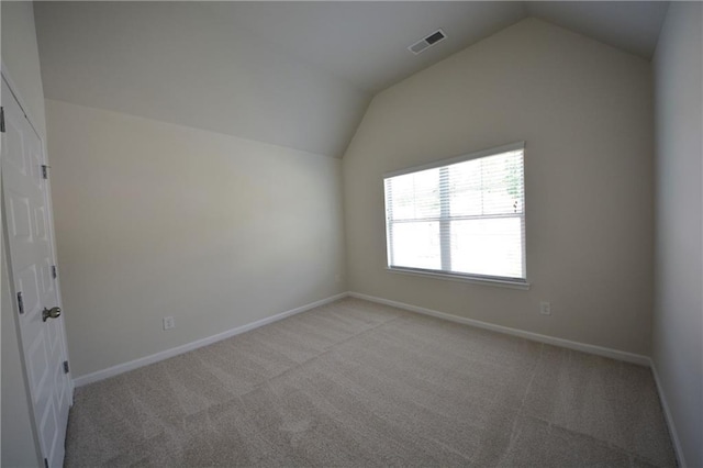 7753 Hansel Ln, Lithonia, GA 30058 - unfurnished room with vaulted ceiling and light colored carpet