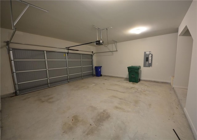 7753 Hansel Ln, Lithonia, GA 30058 - garage featuring a garage door opener and electric panel