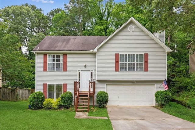 5519 Princeton Oaks Ln, Sugar Hill, GA 30518 - split foyer home featuring an attached garage, driveway, and a chimney