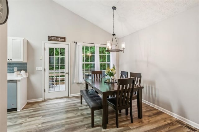 5519 Princeton Oaks Ln, Sugar Hill, GA 30518 - living room with light colored carpet, ceiling fan, baseboards, and high vaulted ceiling