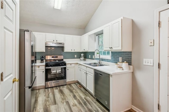 5519 Princeton Oaks Ln, Sugar Hill, GA 30518 - dining area with a chandelier, light wood-type flooring, baseboards, and high vaulted ceiling