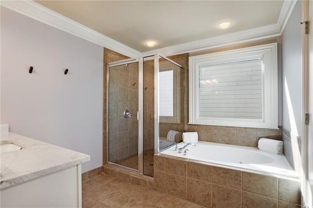 1604 Gilstrap Ln NW, Atlanta, GA 30318 - full bath featuring a bath, vanity, a stall shower, ornamental molding, and tile patterned floors