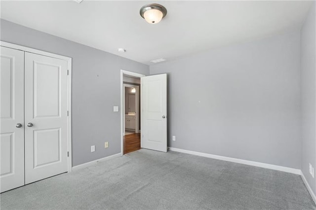1604 Gilstrap Ln NW, Atlanta, GA 30318 - unfurnished bedroom with carpet and a closet