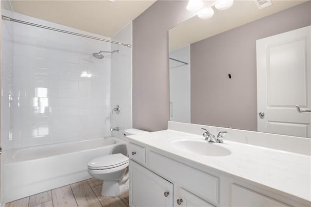 1604 Gilstrap Ln NW, Atlanta, GA 30318 - full bath featuring vanity,  shower combination, and wood finished floors